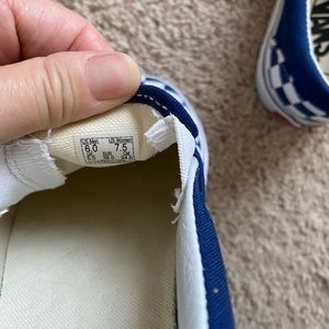 Blue and white slip on Vans